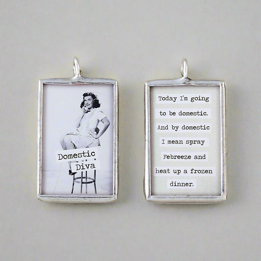 two sided jewelry charm that has a vintage photo and says Domestic Diva