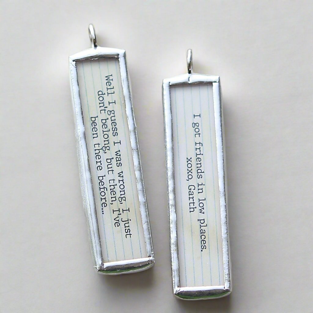 two sided soldered charm that says Friends In Low Places