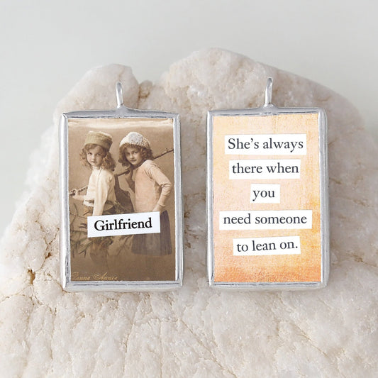 two sided soldered jewelry charm that says Girlfriend