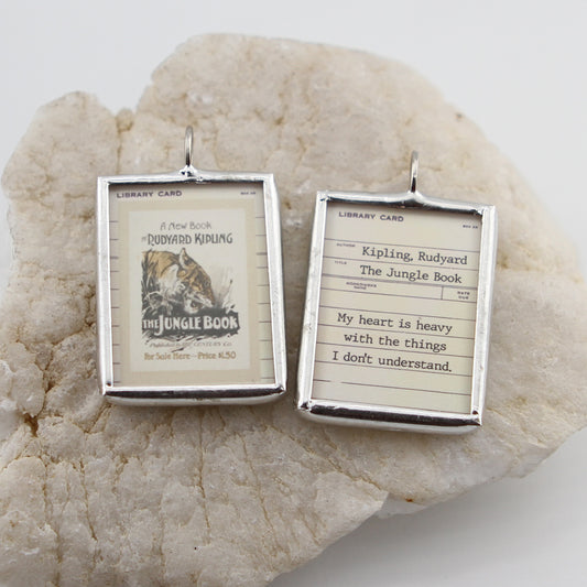 The Jungle Book Cover Quote Soldered Art Jewelry Charm or Necklace