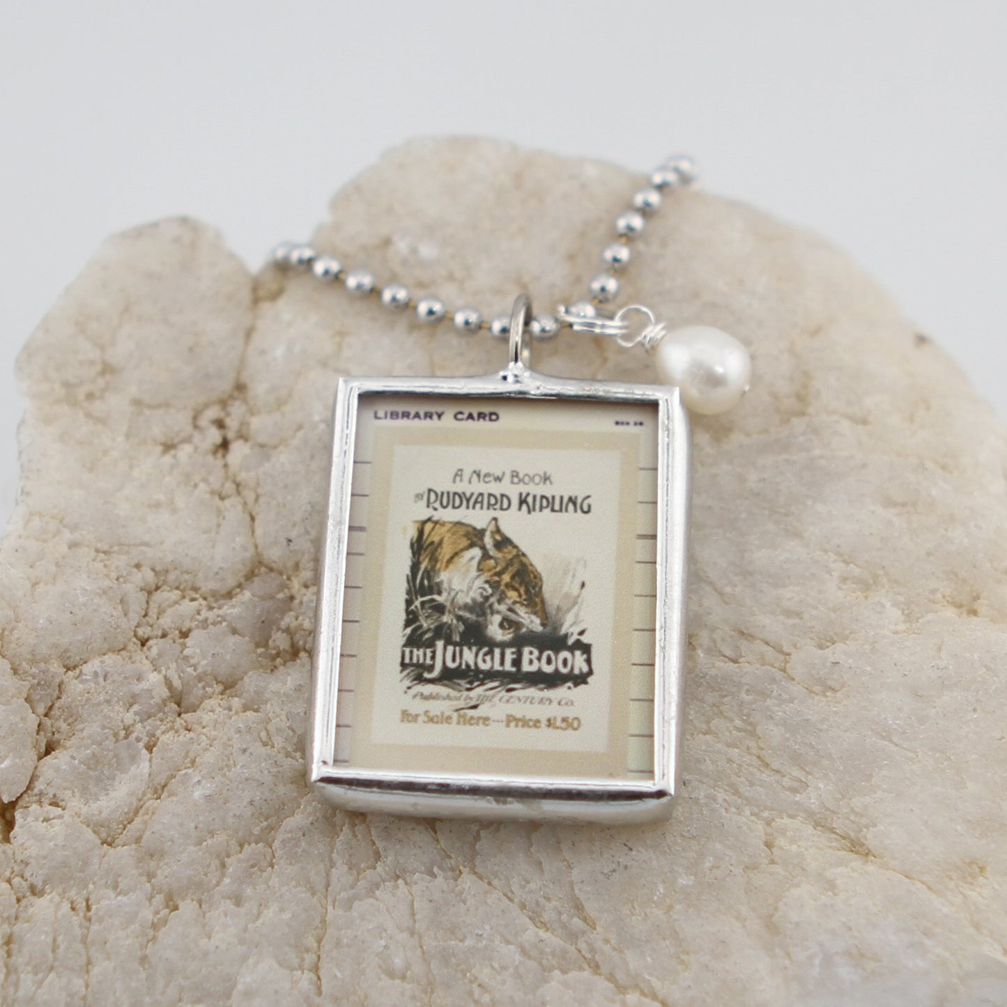 The Jungle Book Cover Quote Soldered Art Jewelry Charm or Necklace
