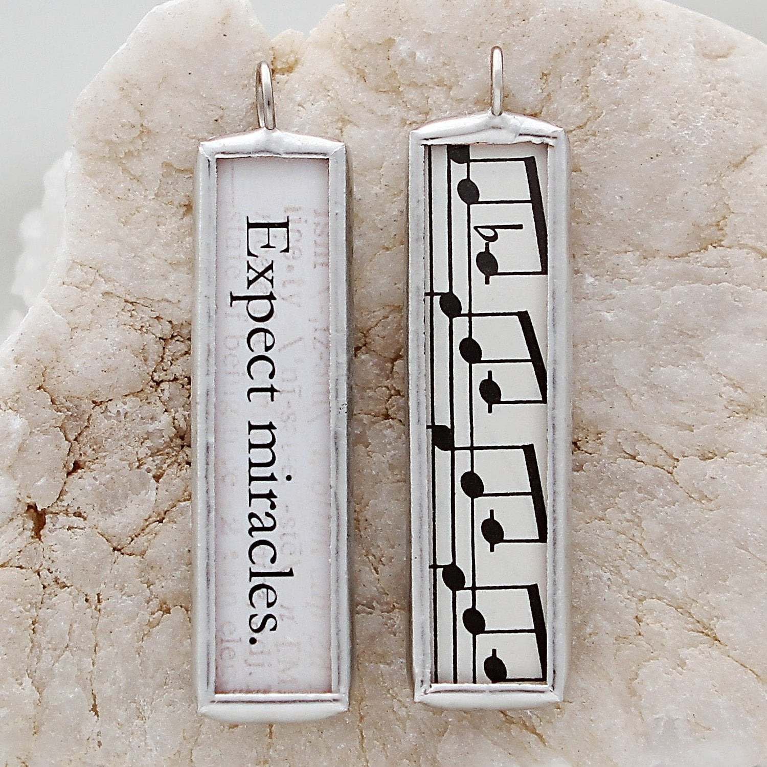 two sided soldered art charm that says Expect Miracles on it 