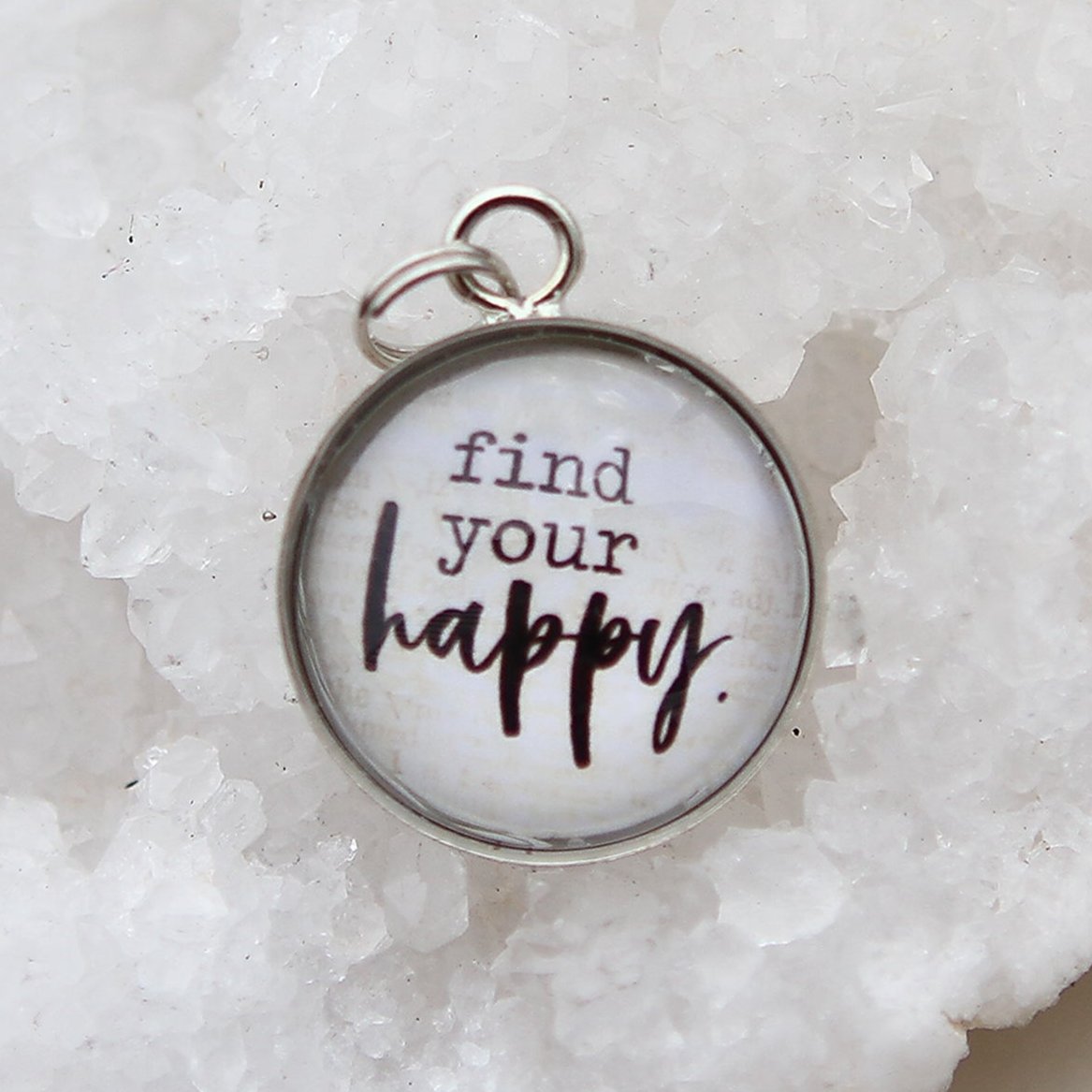 SIlver round jewelry charm that says Find Your Happy